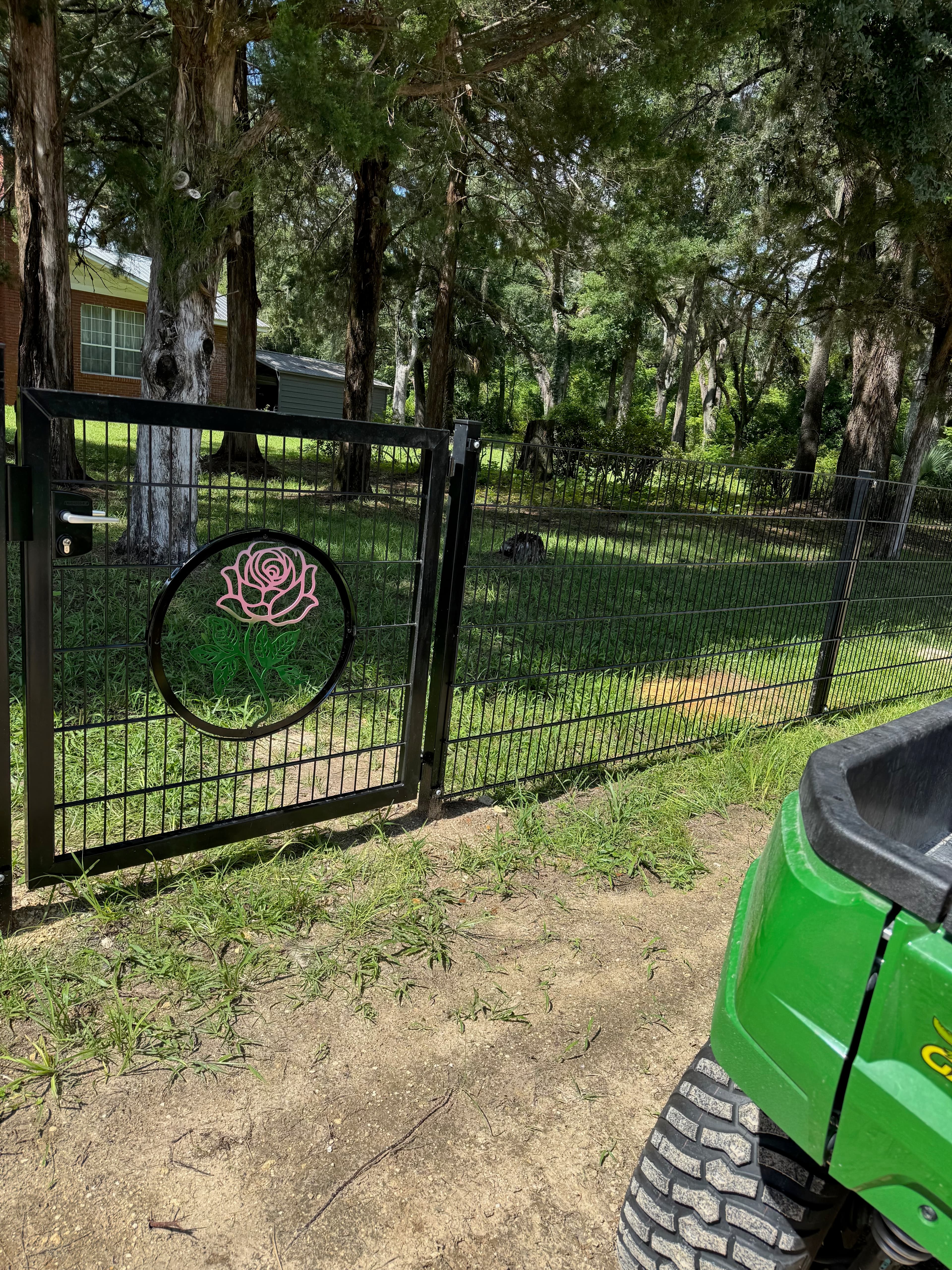 Custom decorative gate with rose medallion design